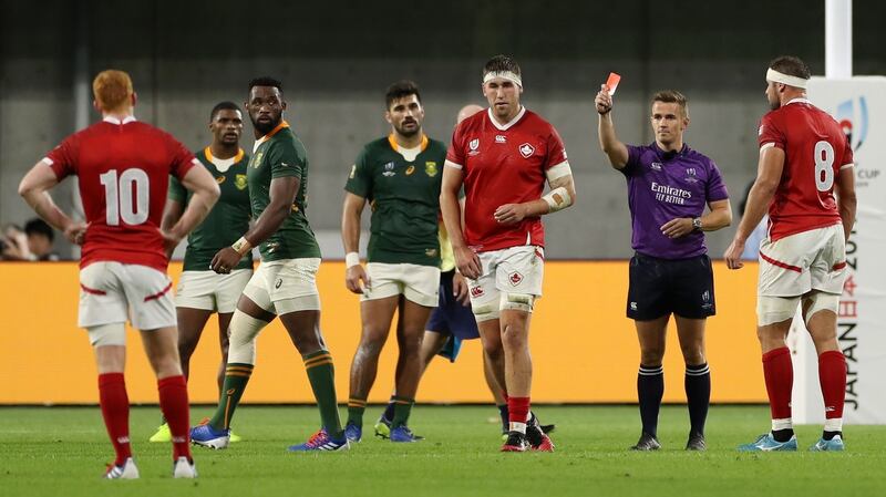 Referee Luke Pearce shows Josh Larsen a red card during Canada’s defeat to the Springboks. Photograph: Mike Hewitt/Getty