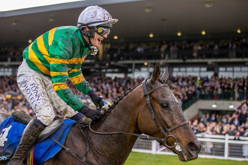 Jockey Paul Townend celebrates winning the Irish Grand National with  I Am Maximus last year. He will be heading to Aintree this year. Photograph: Morgan Treacy/Inpho 