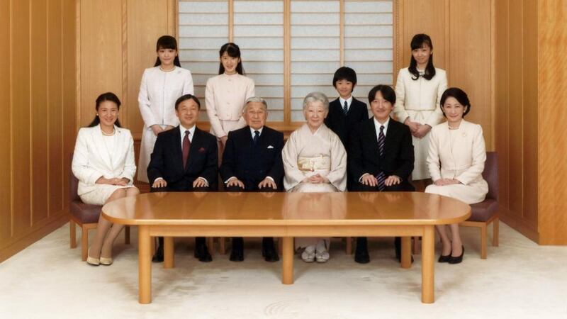Japanese royal wedding: Emperor Akihito (seated, third left) and Empress Michiko (seated, fourth left), with Crown Prince Naruhito (seated, second left), his wife, Crown Princess Masako (seated, left), their daughter, Princess Aiko (top second left), Prince Akishino (seated second right), his wife, Princess Kiko (seated right), their daughters, Princess Mako (top left) and Princess Kako (top right), and their son, Prince Hisahito (top second right). Photograph: Imperial Household Agency of Japan via Reuters