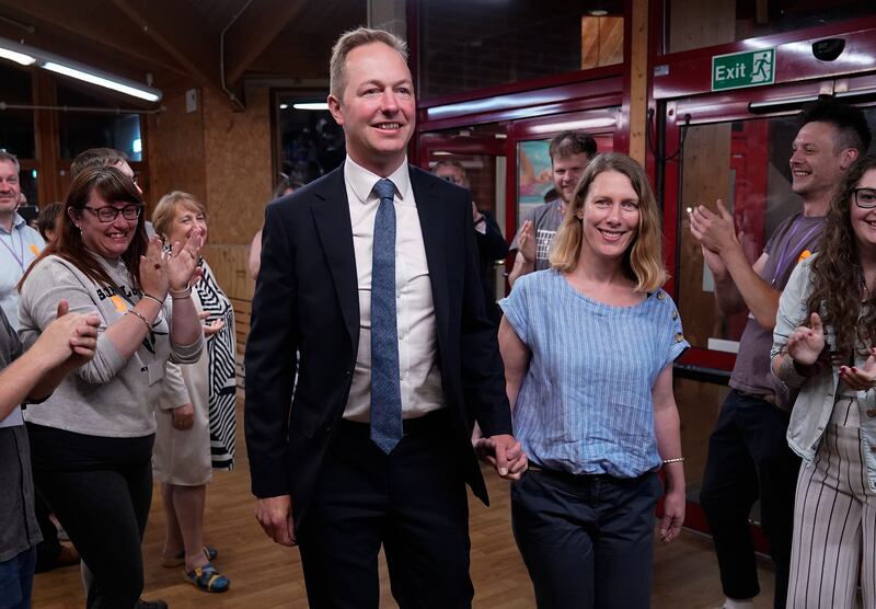 The vitorious Liberal Democrats' byelection candidate Richard Foord and his wife Kate are greeted by supporters as they arrive at the Lords Meadow Leisure Centre, in Crediton, Devon for the result of the Tiverton and Honiton byelection. Photograph: PA