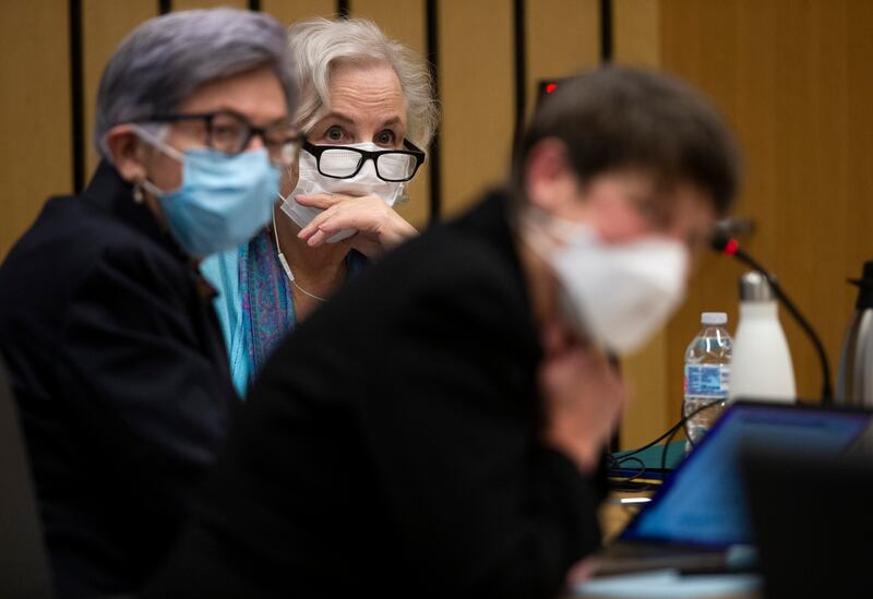 Nancy Crampton Brophy (centre) surrounded by her defence lawyers. Photograph: Dave Killen/The Oregonian/AP