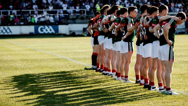 Mayo players stand for the national anthem before the All-Ireland qualifier defeat to Kildare in Newbridge which ended their season. Photograph: James Crombie/Inpho
