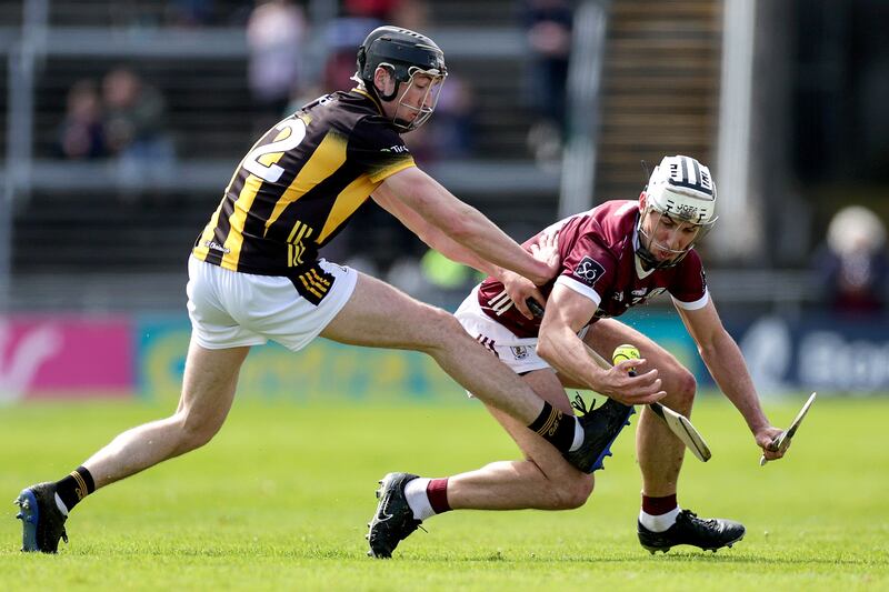 Kilkenny's Tom Phelan tackles Galway's Daithí Burke during the Leinster SHC clash at Pearse Stadium. Photograph: Laszlo Geczo/Inpho
