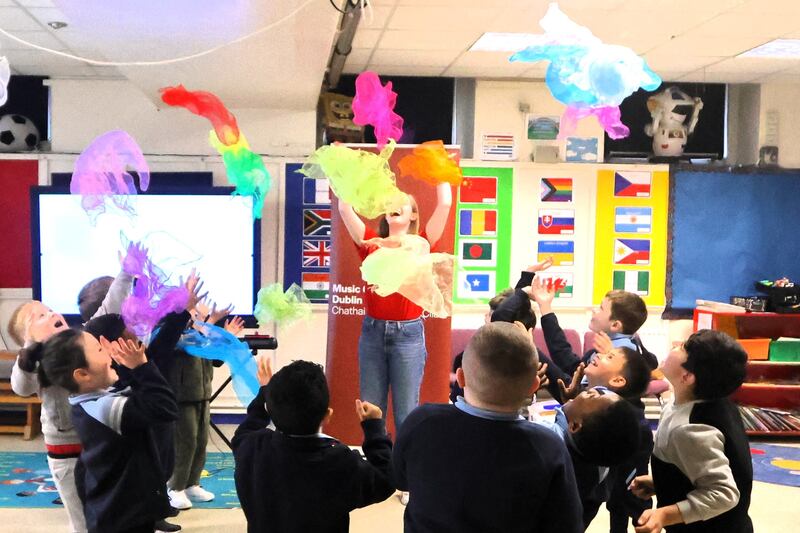 Music Generation teacher Ailbhe Kehoe teaches a group of children at O'Connell Boy's School in north Dublin. Photograph: Ronan McGreevy