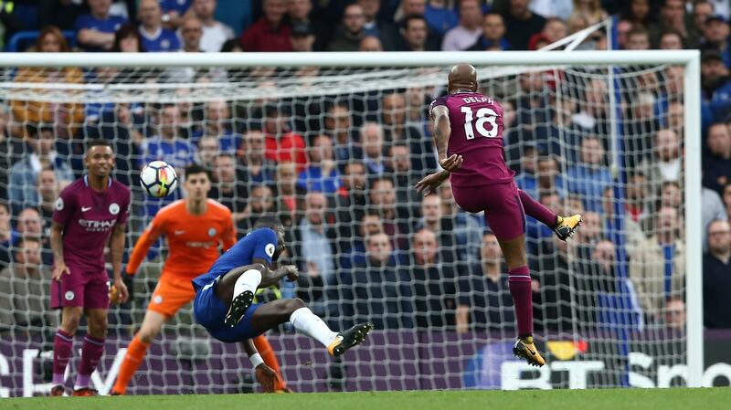 Manchester City’s Fabian Delph takes a shot. Photograph: EPA