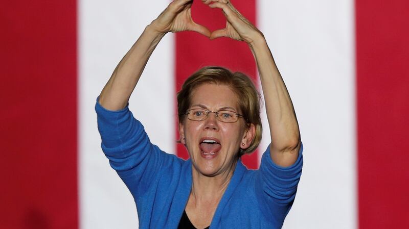 Democratic  candidate Senator Elizabeth Warren makes a heart gesture as she addresses supporters at her Super Tuesday night rally in Detroit, Michigan. Photograph: Rebecca Cook/Reuters.