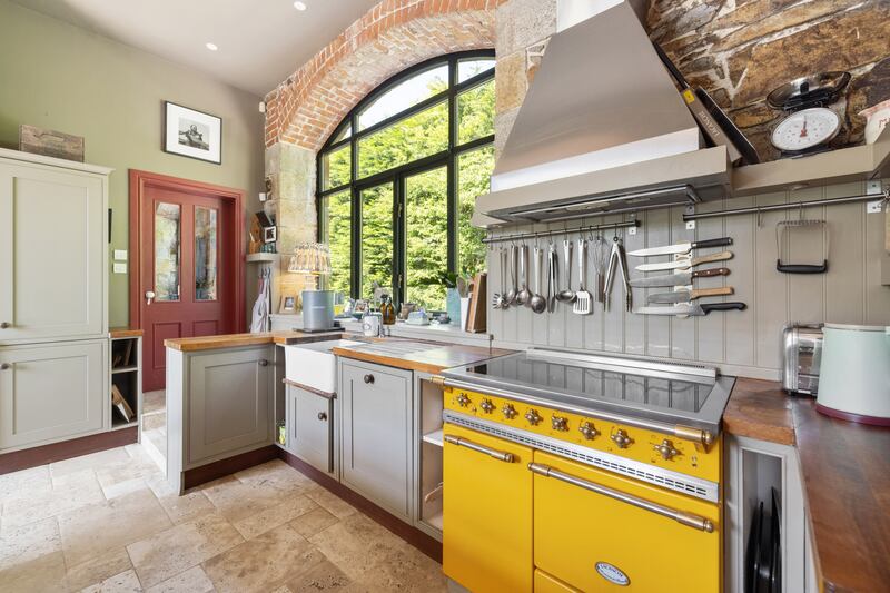 A Lacanche range takes centre stage in the kitchen