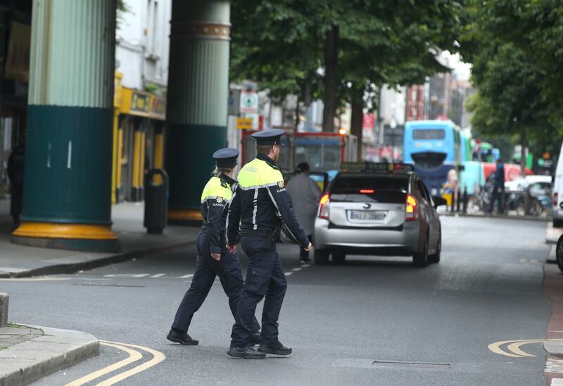 Members of the Garda out on patrol on Talbot Street in Dublin's north inner city. Photograph: Stephen Collins/Collins Photos