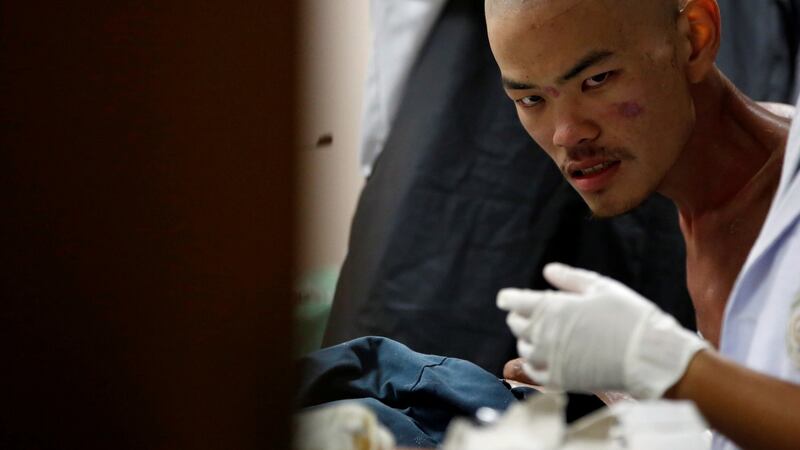 Taiwanese Liang Sheng Yueh undergoes treatment at a hospital after being rescued in Kathmandu, Nepal. Photograph: Reuters/Navesh Chitrakar