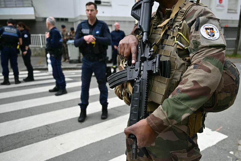 French military and police officers stand close to Notre-Dame de Toutes-Aides school after the attack on Thursday. Photograph: Loic Venance/Getty