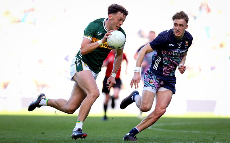 Kerry’s David Clifford and Donnacha McHugh of Mayo in the Division 1 final. Photograph: Ryan Byrne/Inpho