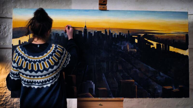 Vanessa Lawrence  painting her perspective looking out on New York from her 91st storey studio. Photograph: BBC/Top Hat Productions