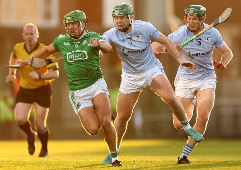Kilmallock’s Robbie Hanley with Ronan Lynch and William O'Donoughue of Na Piarsaigh during the Limerick final at the TUS Gaelic Grounds. Photograph: James Crombie/Inpho
e