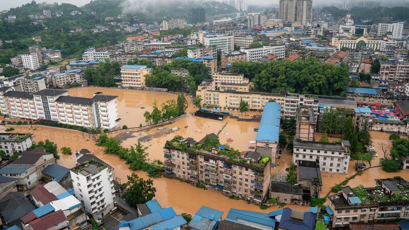 An aerial view shows a flooded part of Enshi City, Hubei province, China on Saturday. Photograph: XIE Chuanhui China Out/ EPA