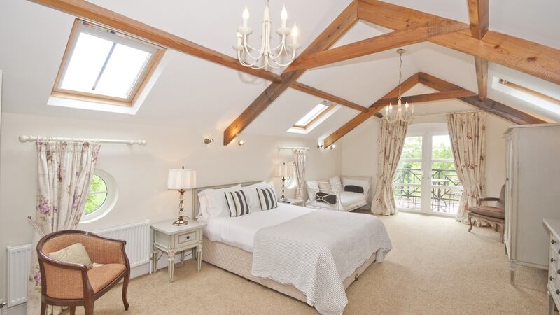 The Old Boley boasts a vaulted roof in the master bedroom that opens out to a balcony.