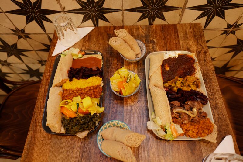 The vegan (left) and meat selections, both served with injera bread.
Photograph: Alan Betson

