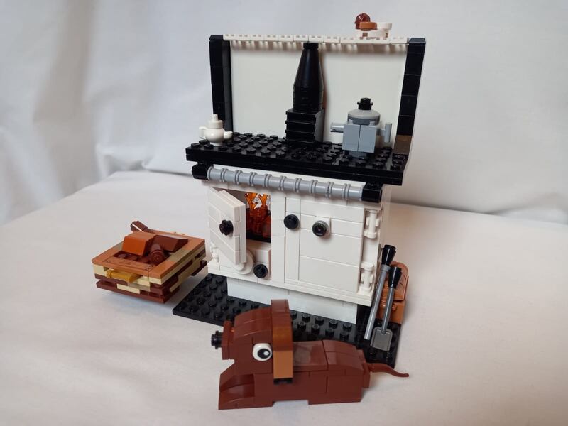 Callum Wynton’s Stanley range, based on his grandmother's, features an ash bucket and a dog warming itself