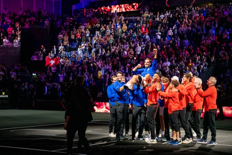 Roger Federer is lifted by fellow tennis players after playing as part of Team Europe at the Laver Cup. Photograph: James Hill/The New York Times
