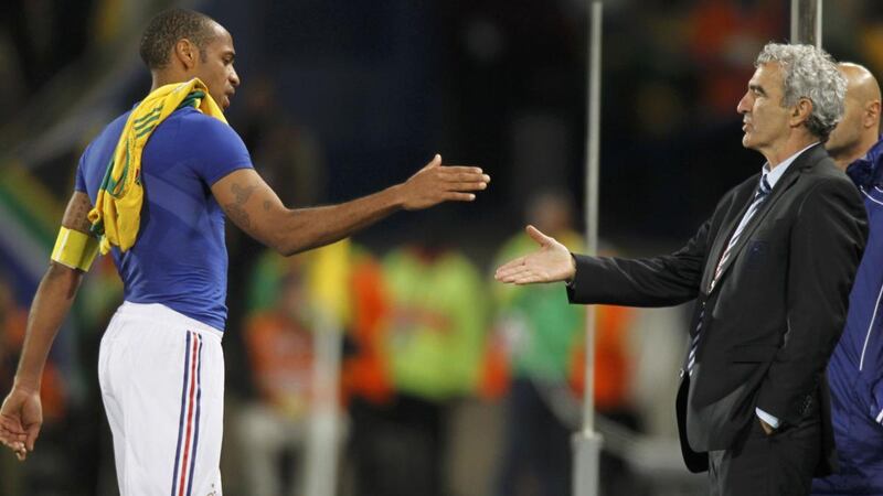 Thierry Henry shakes hands with France coach Raymond Domenech after their World Cup game against South Africa at Free State stadium in Bloemfontein in  June, 2010. Photograph: Charles Platiau/Reuters
