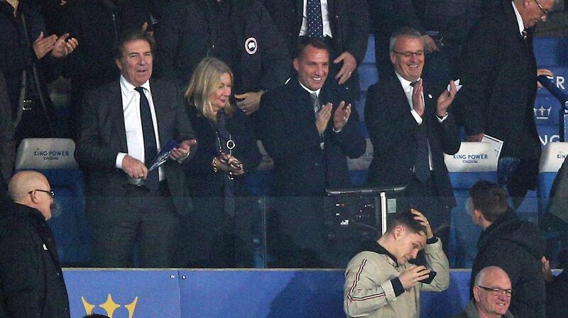 New Leicester City manager Brendan Rodgers is pictured beside  club chief executive Susan Whelan  and director Jon Rudkin during the Premier League match against Norwich City at the King Power Stadium. Photograph:   Nigel French/PA Wire