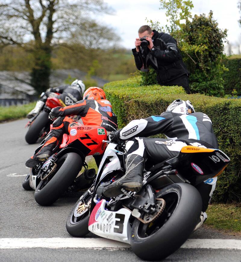Ryan Farquhar  is caught in a Dunlop sandwich as William leads the Dungannon man and his brother Michael at the Cookstown 100 today.
Photograph: Stephen Davison

