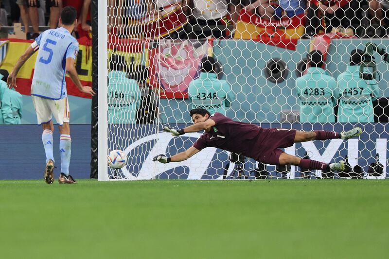 Morocco's goalkeeper Yassine Bounou saves a penalty from Spain's Sergio Busquets during the shoot-out at the end of the World Cup round of 16 match at the Education City Stadium. Photograph: Karim Jaafar/AFP via Getty Images
