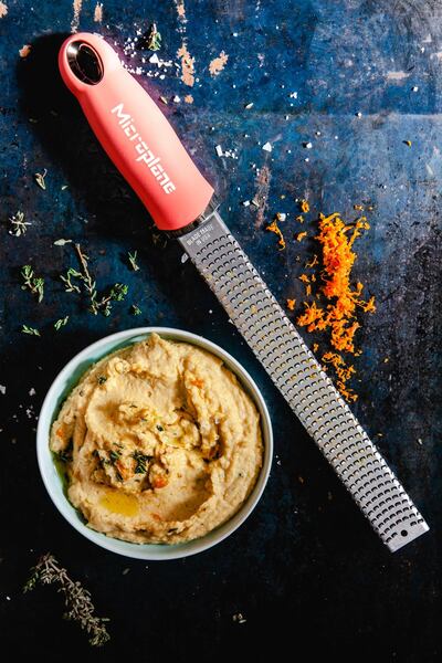 Microplane zesters make short work of lots of kitchen tasks, including pureeing garlic and are widely available and cost between €20 and €30