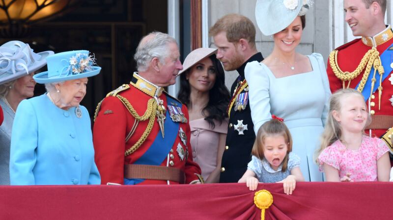 Royal rift: Meghan and Harry with Queen Elizabeth, Prince Charles, the duchess and duke of Cambridge, and other members of the British royal family at Buckingham Palace in 2018. Photograph: Karwai Tang/WireImage via Getty