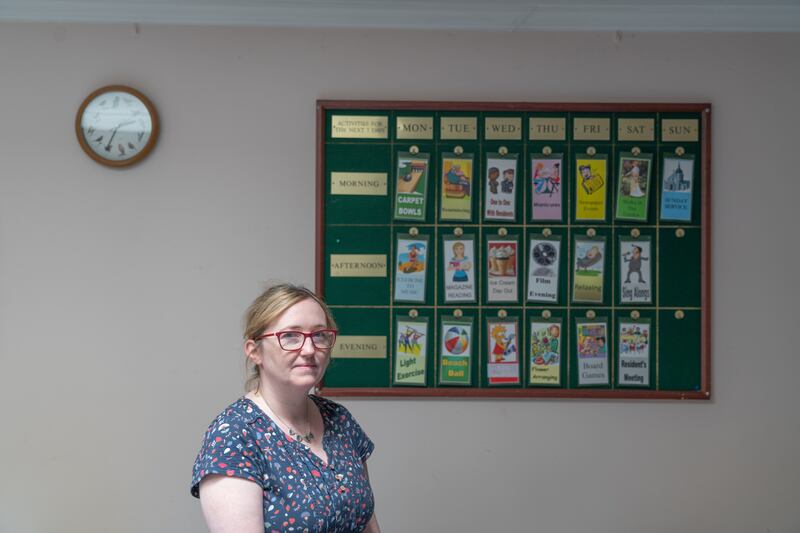 Stella Maris co-owner Aine Moran in front of the week’s activity board, now redundant. Photograph: Barry Cronin 