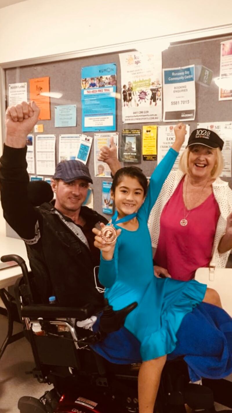 Keisha with her bronze medal for dancing.