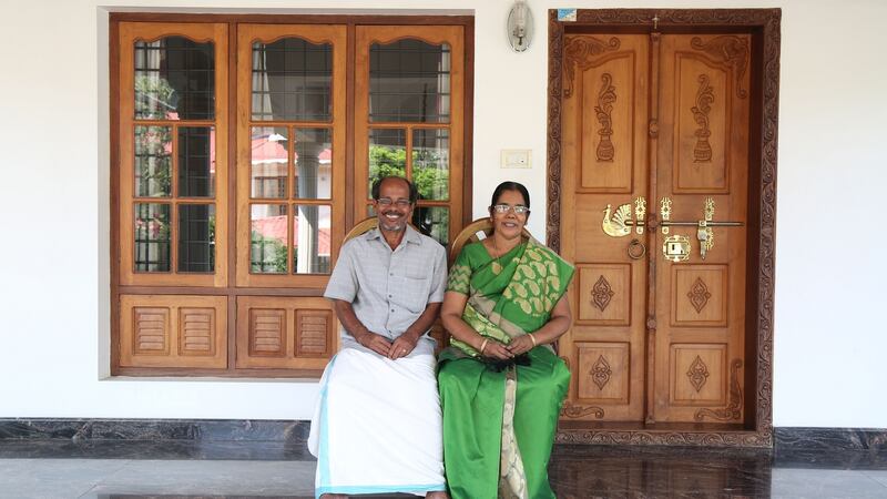 Baby Paul, right, and Paul Mundadan, parents of a nurse living in Ireland, at their residence in Angamaly, Kochi city, Kerala. Photograph: Sivaram V