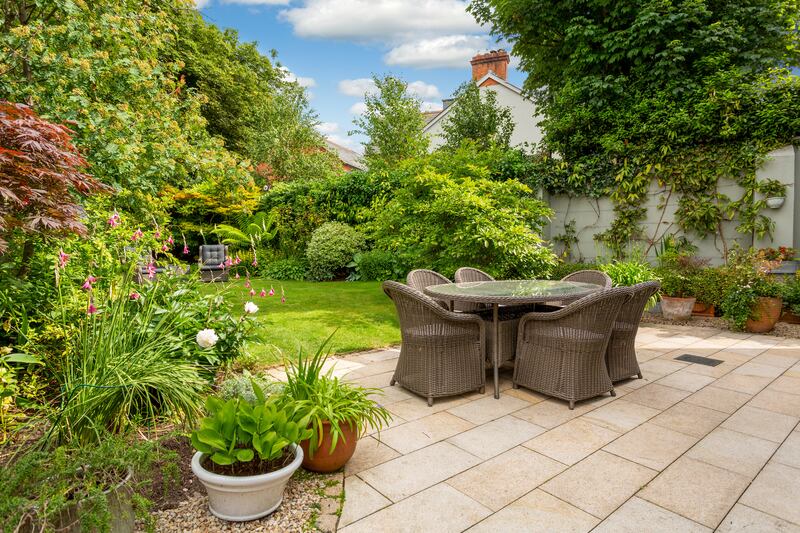The garden is oriented southeast, with old granite walls. Photograph: Keith Owens