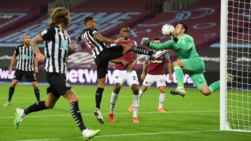 Newcastle United’s Callum Wilson scores his side’s opener against West Ham. Photograph: Michael Regan/PA