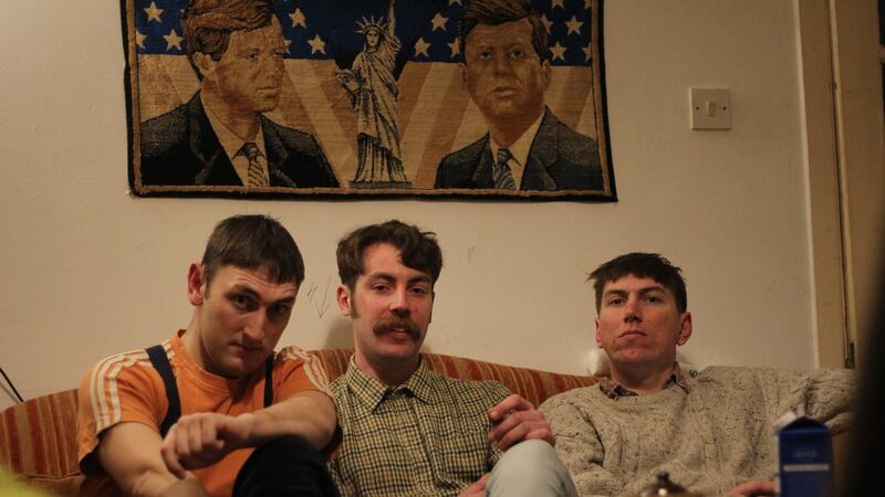 Mary Wallopers and TPM member Charles Hendy with band members, his brother Andrew and Seán McKenna.