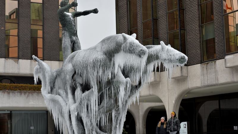 The sculpture Fountain at the Irish Life Building in Dublin is gripped by frozen icicles during the snowfall associated with Storm Emma and The Beast from the East. Photograph: Alan Betson / The Irish Times