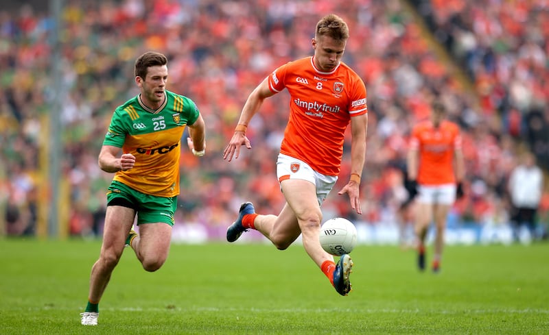 Armagh’s Rian O’Neill and John Ross Molloy of Donegal. Photograph: Ryan Byrne/Inpho