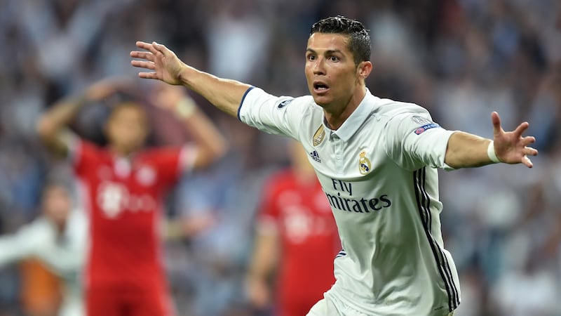 Ronaldo wheels away after scoring his second goal against Bayern Munich. Photograph: Getty Images