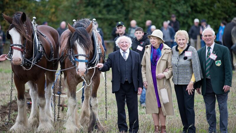 Anna May McHugh with Michael D and Sabina Higgins and Dennis Keoghane of the National Ploughing Associatio at day one of the 2018 event in Tullamore. Photograph: Tom Honan