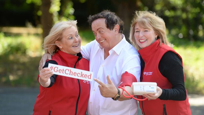 No pressure: RTÉ broadcaster Marty Morrissey with Irish Heart health check manager Marese Damery and nurse Mary Rose Jordan.  Photograph: Dara Mac Dónaill