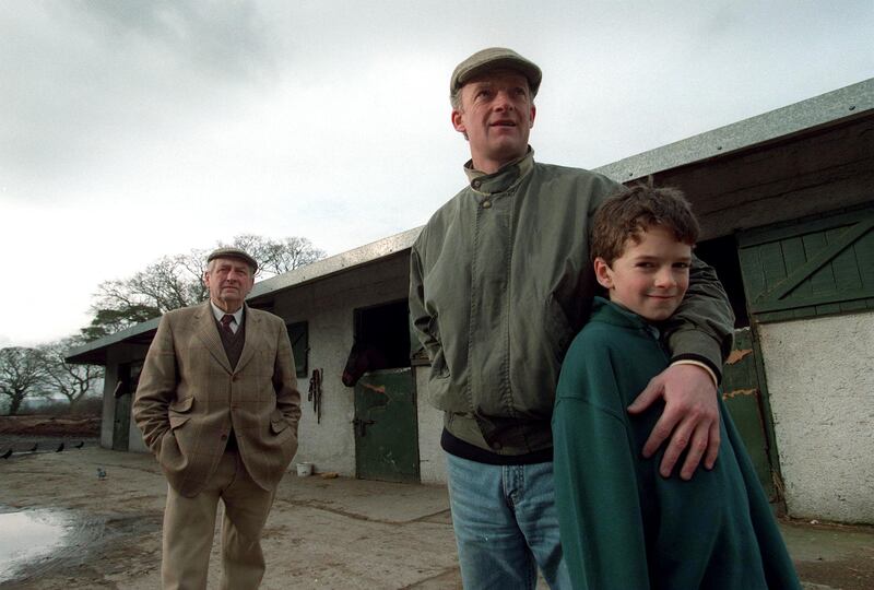 Mullins with his son Patrick and father Paddy at the family farm in Goresbridge in 1999. Photograph: Billy Stickland/Inpho