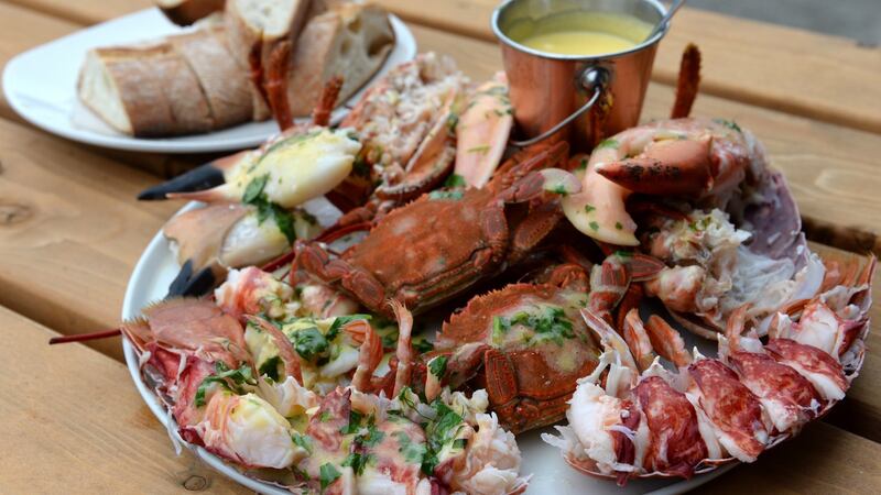 Plate of the day:  a bounteous platter of shellfish, bathed in lemon and garlic butter, at Michael’s restaurant. Photograph: Dara Mac Dónaill