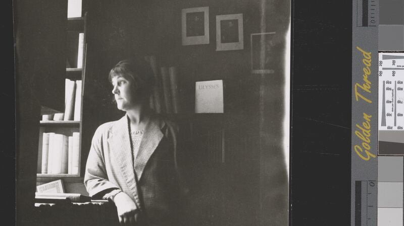 Harriet Shaw Weaver looking out the window of Shakespeare and Company. Photograph: Carlton Lake Collection of Maurice Saillet. Harry Ransom Center.