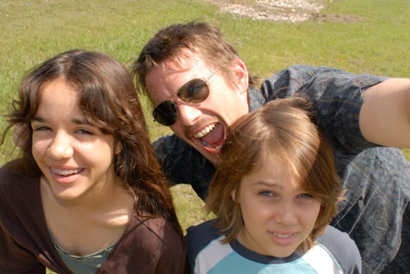 Lorelei Linklater, Ethan Hawke and Ellar Coltrane in Boyhood, directed by Richard Linklater.