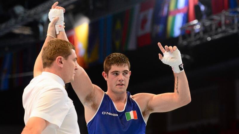 Joe Ward celebrates after beating Mateusz Tryc of Poland. Photograph: Paul Mohan/Sportsfile