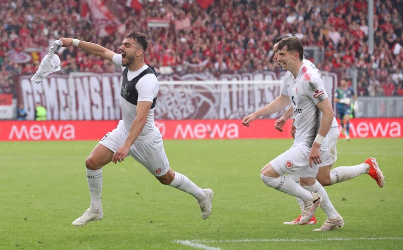 Danel Sinani of FC St Pauli celebrates scoring against SV Wehen Wiesbaden. Photograph: Alex Grimm/Getty Images
