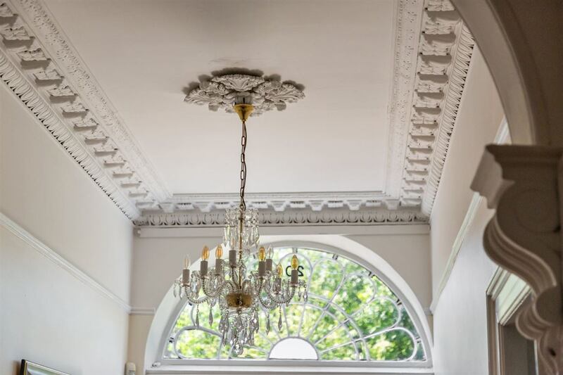 Chandelier, centre rose, and coving