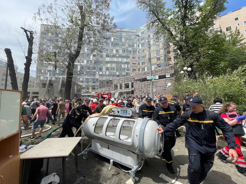 Medical equipment is moved away from the wreckage of Ohmatdyt hospital on Monday. Photograph: Dan McLaughlin