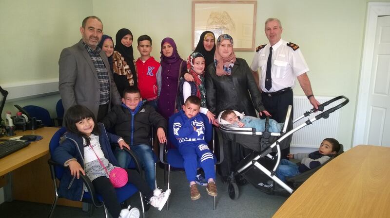 The Al-Sulaimans shortly after they arrived in Wicklow, with Garda Supt Paul Hogan