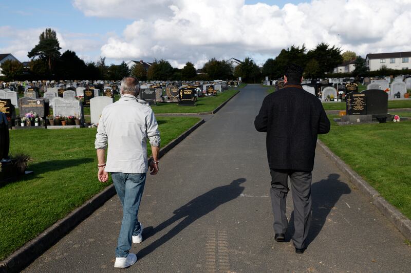 Harry Gilbert Fassaroe and Ben Lynch visit the graveyard in Bray. Photograph: Nick Bradshaw