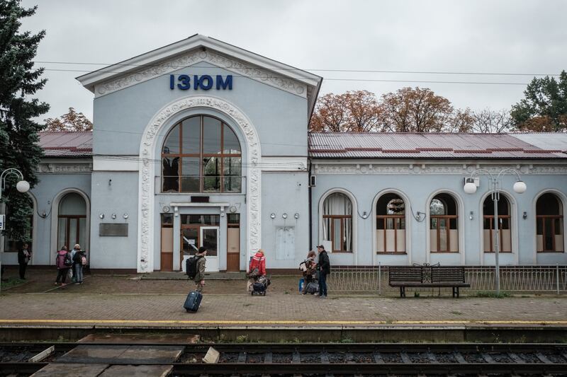 Passengers arrive by the first train as its service between Izyum and Kharkiv restarts after seven months of closure. Photograph: Yasuyoshi Chiba/AFP